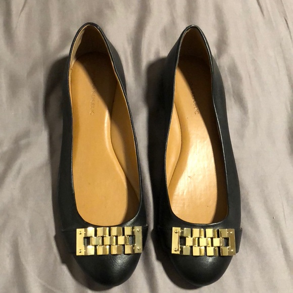 black and gold flat shoes